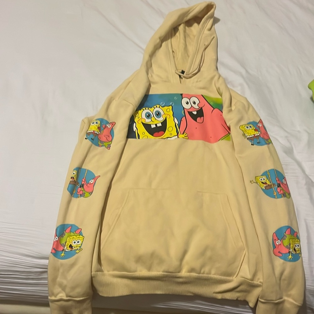 Spongebob and Patrick nickelodeon hoodie. Contains bright and playful images.